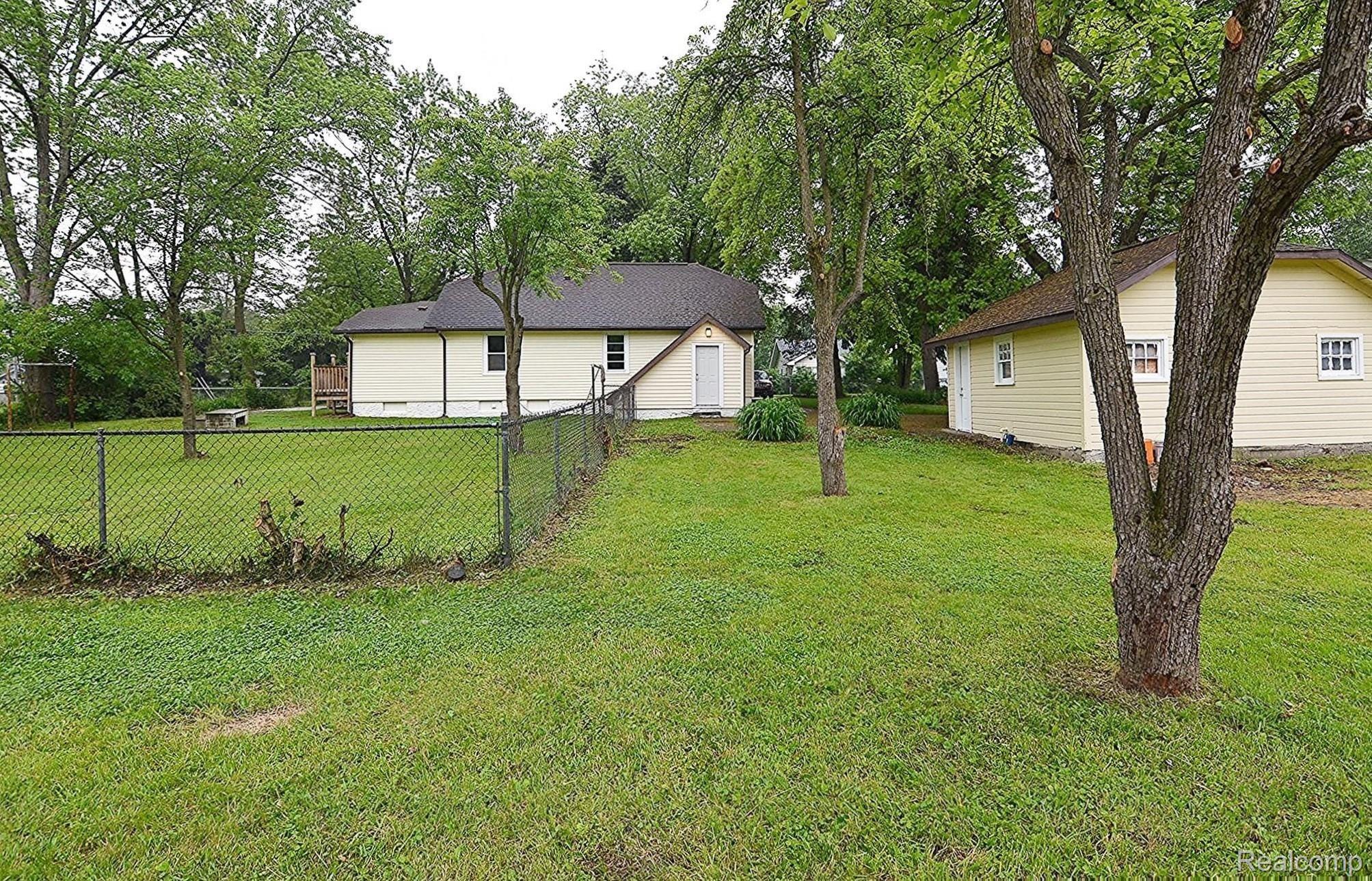 2233 East Bristol Road Burton, MI 48529 - Photo 23 of 24 HUGE FENCED BACK YARD