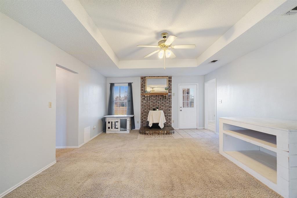 201 County Road Powderly, TX 75473 - Photo 2 of 26 a view of an empty room with a window
