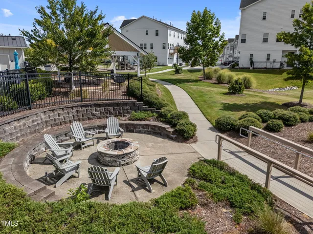 a view of a house with pool side view