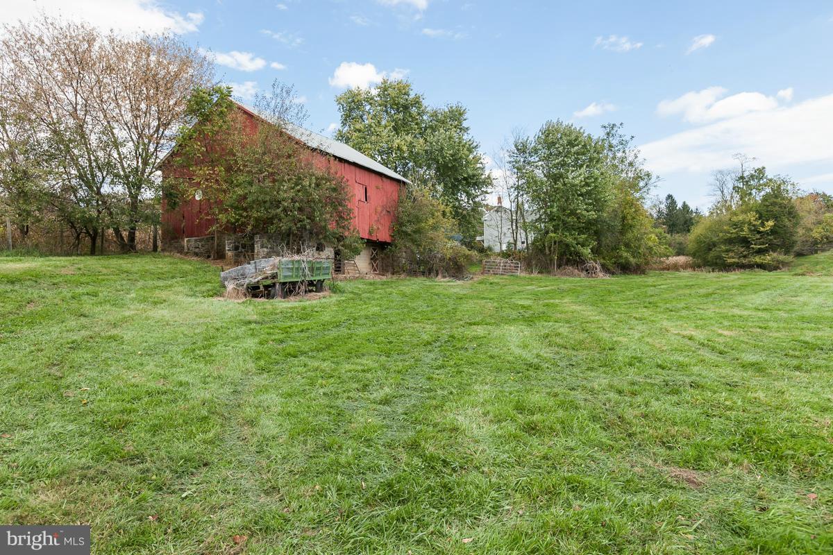 2105 Western Run Road Cockeysville, MD 21030 - Photo 11 of 12 a couple of table and chairs in the grass