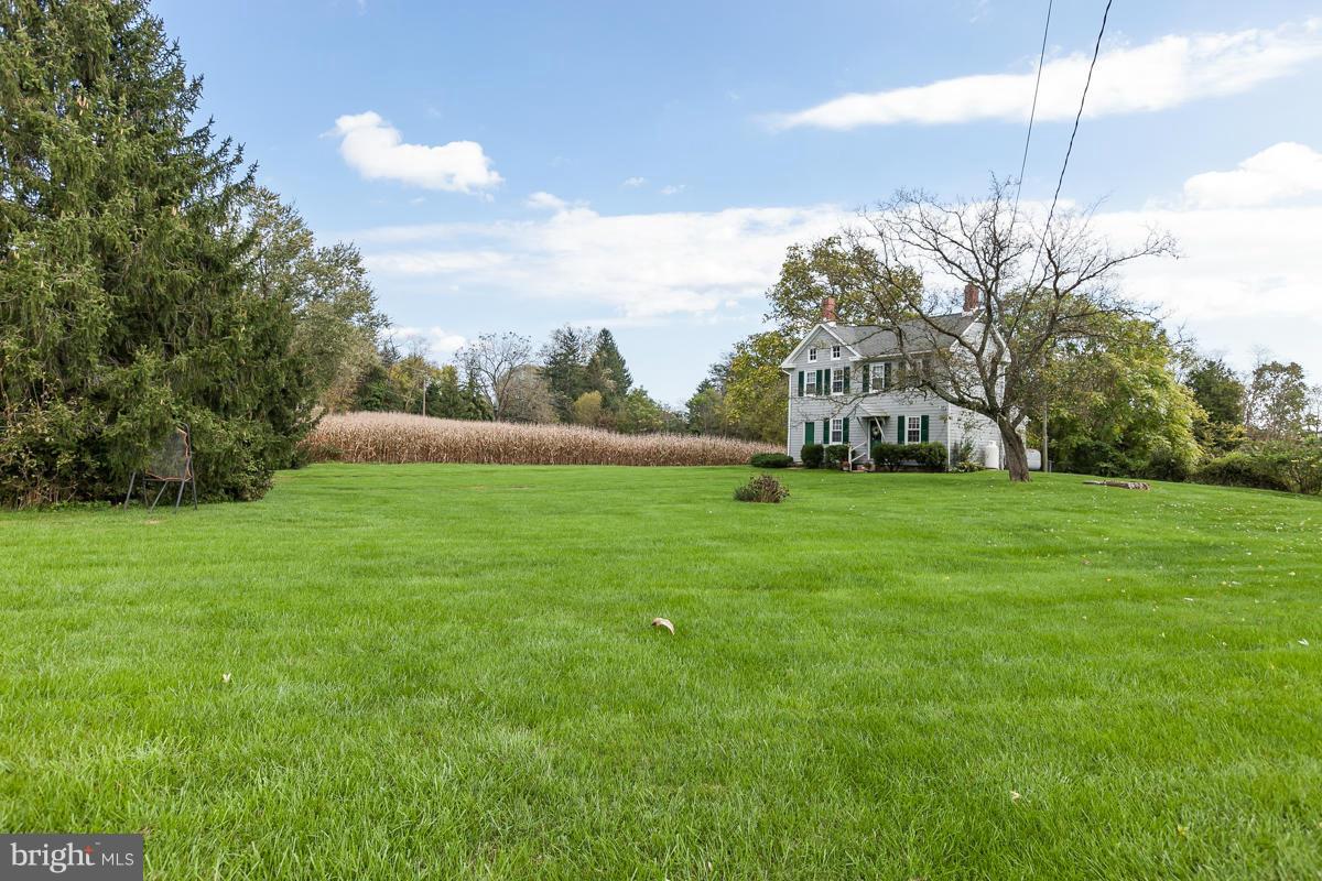 2105 Western Run Road Cockeysville, MD 21030 - Photo 2 of 12 a view of a garden with a building in the background