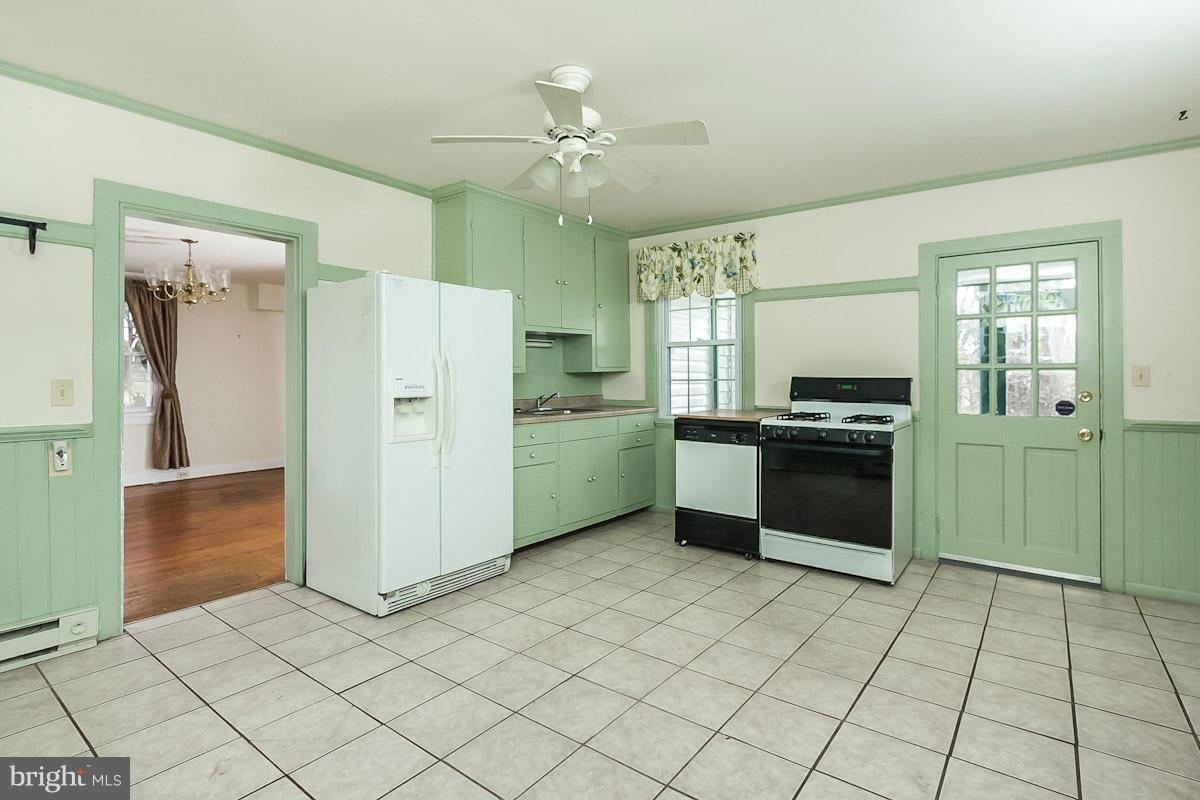 2105 Western Run Road Cockeysville, MD 21030 - Photo 5 of 12 a kitchen with stainless steel appliances a cabinets and a counter top space