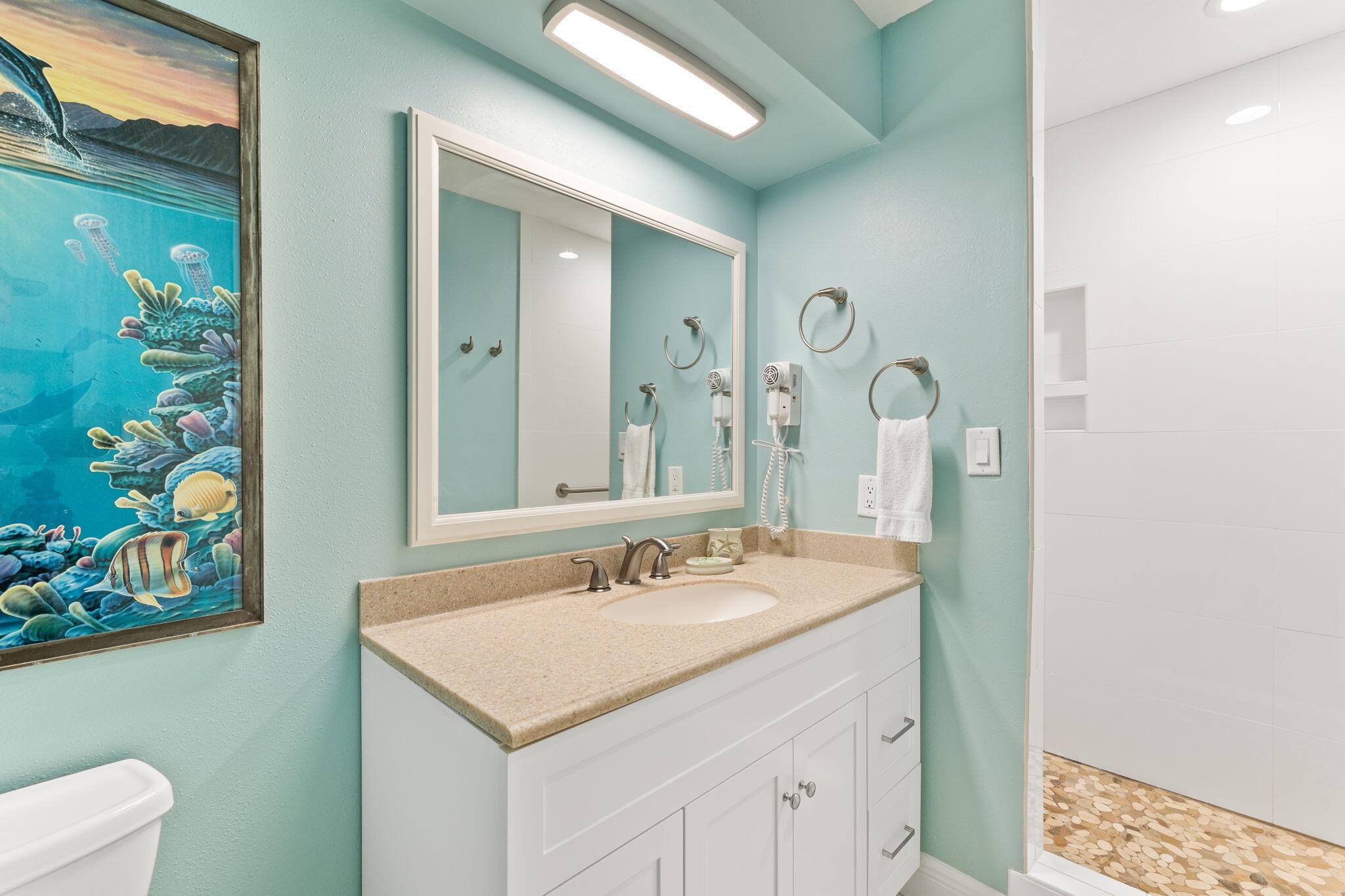 214 Blue Mountain Road, Unit 113 Santa Rosa Beach, FL 32459 - Photo 29 of 35 a bathroom with a sink a vanity and a mirror