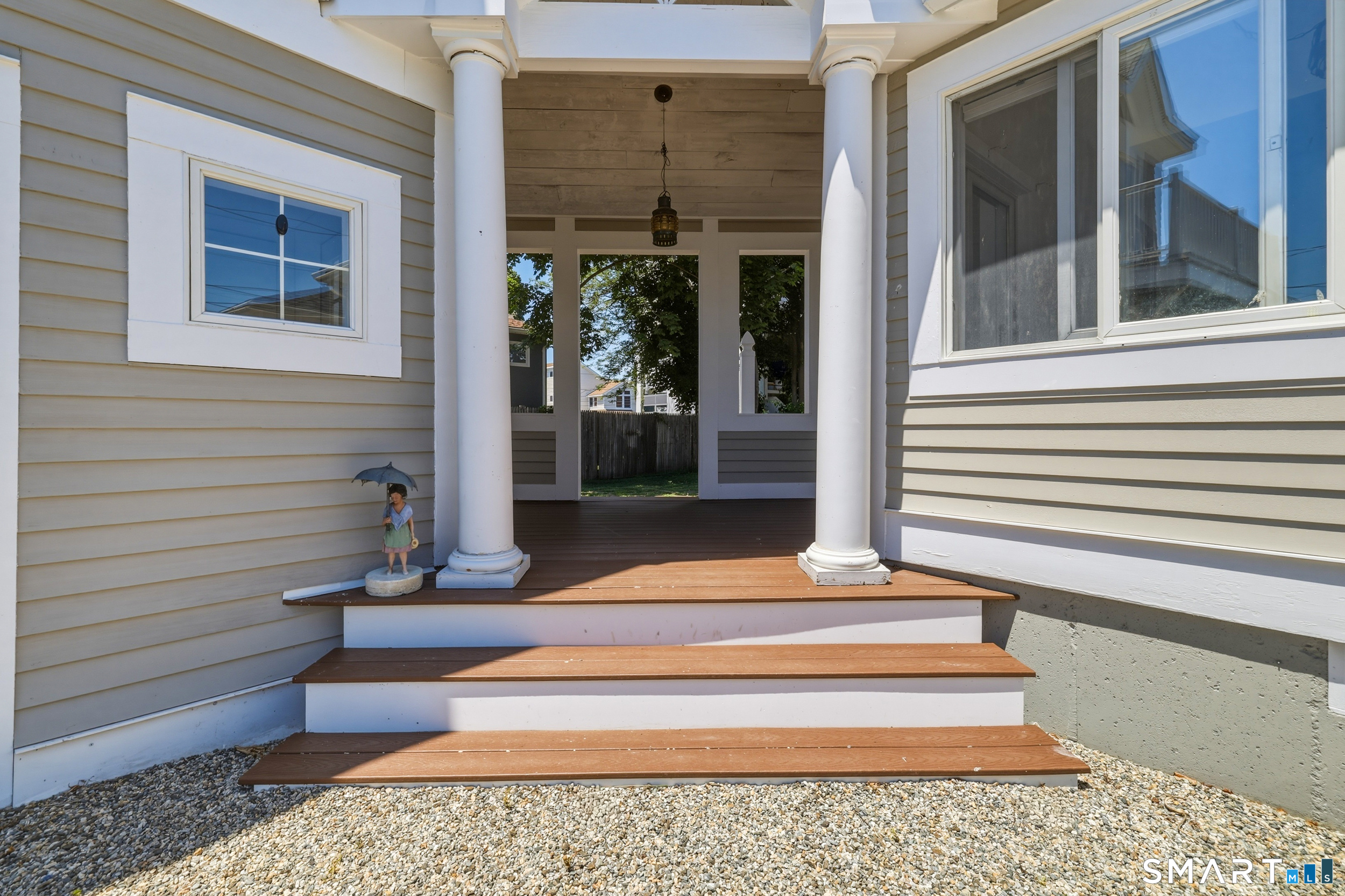 31 Sols Point Road Clinton, CT 06413 - Photo 24 of 40 Back porch leads to the patio and backyard space.