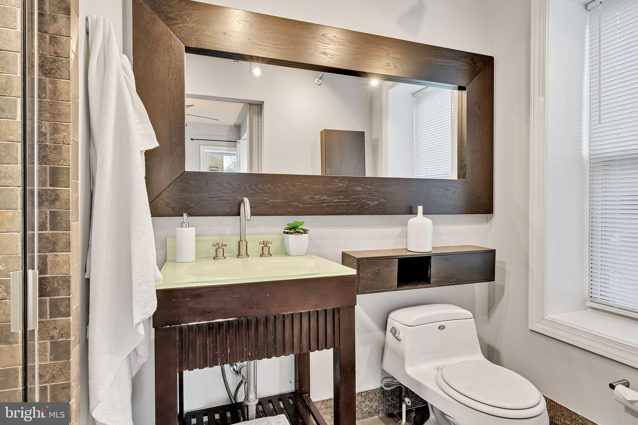 1300 Taylor Street Northwest, Unit 101 Washington, DC 20011 - Photo 22 of 31 Ensuite bath in primary bedroom