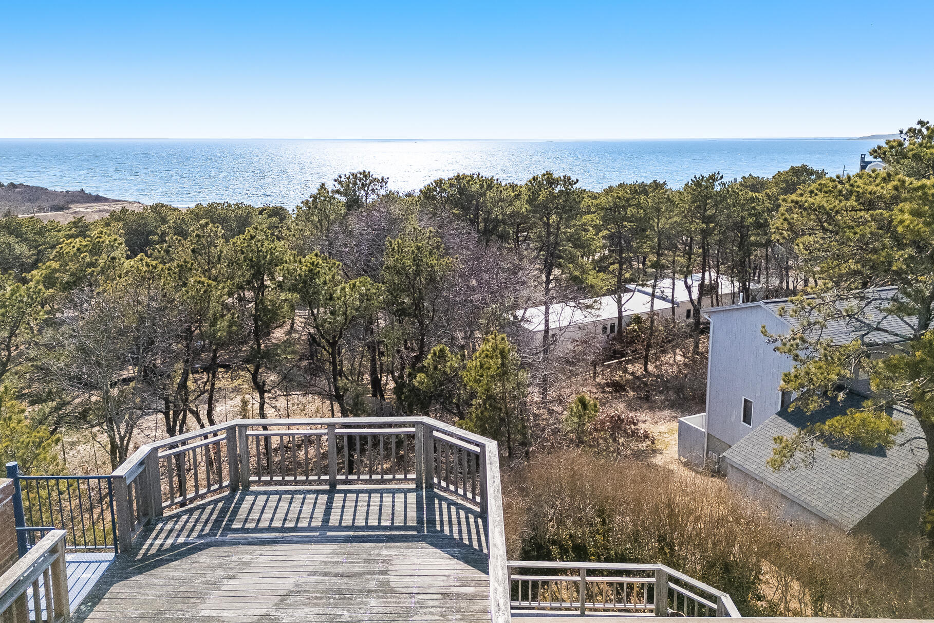 65 Massasoit Road Wellfleet, MA 02667 - Photo 11 of 86 a view of balcony with wooden floor and fence