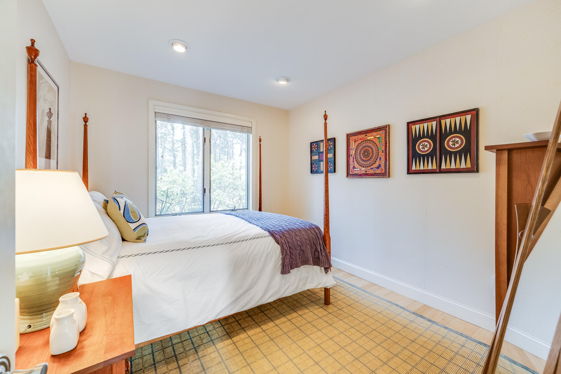 65 Massasoit Road Wellfleet, MA 02667 - Photo 17 of 86 a bedroom with a bed and a window