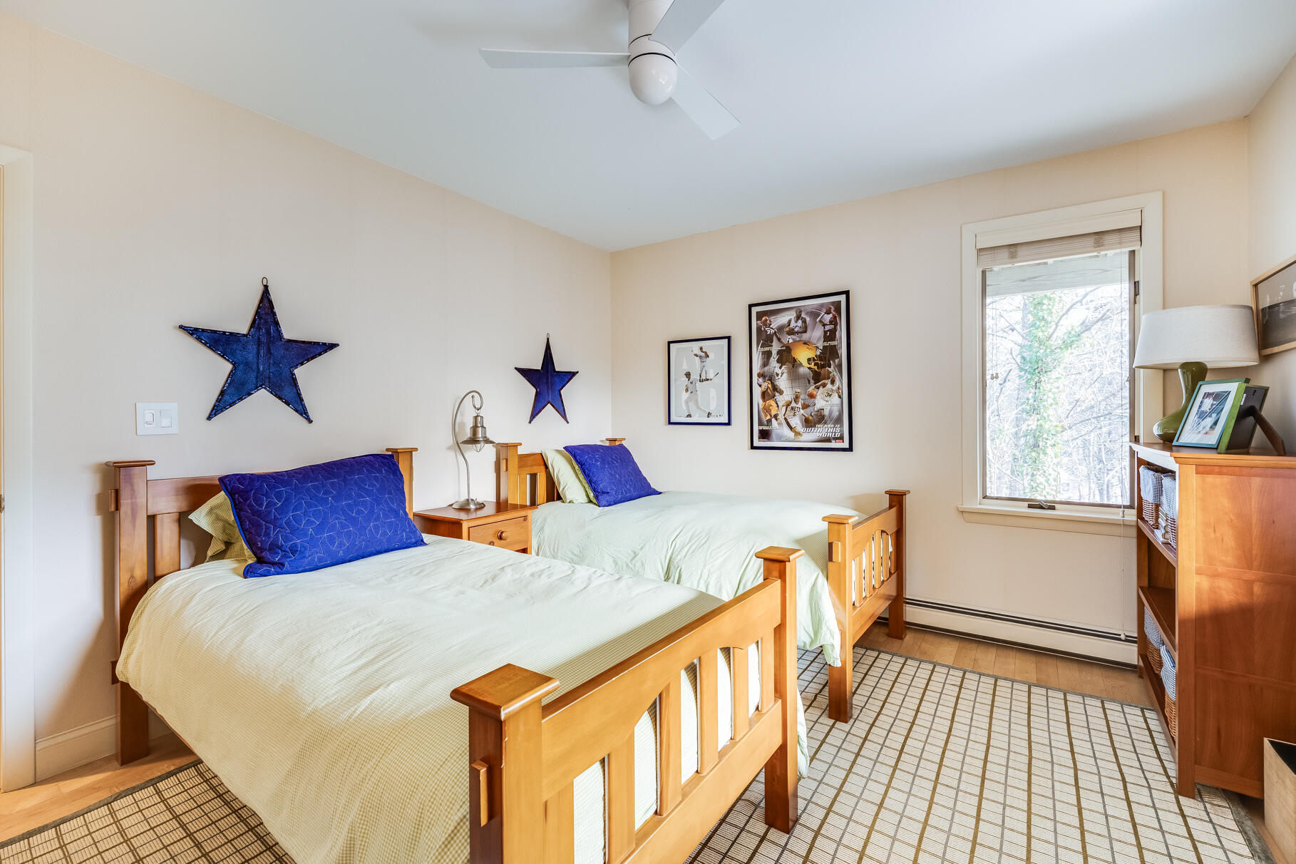 65 Massasoit Road Wellfleet, MA 02667 - Photo 21 of 86 a bedroom with a bed and wooden floor