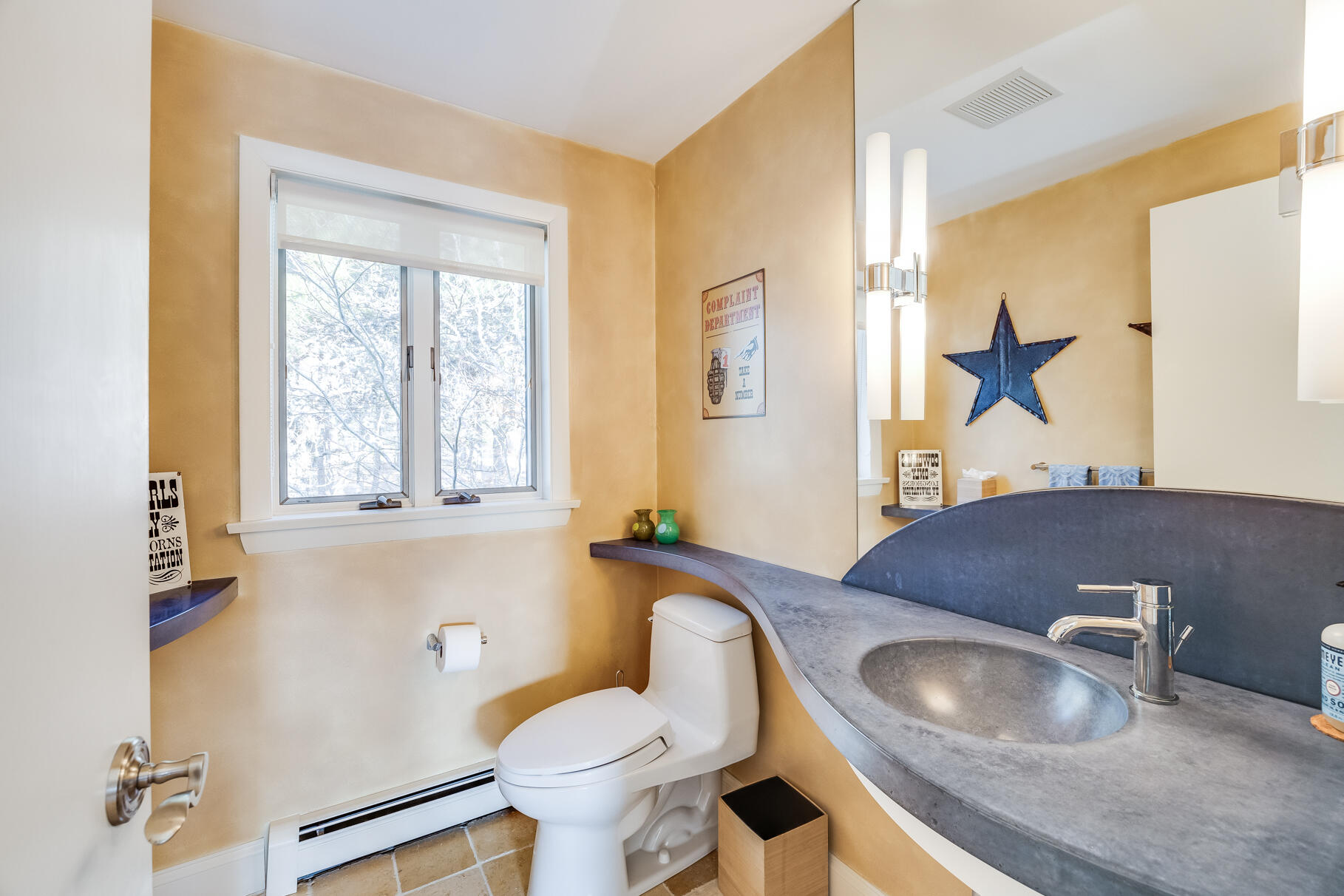 65 Massasoit Road Wellfleet, MA 02667 - Photo 26 of 86 a bathroom with a granite countertop toilet a sink and a window