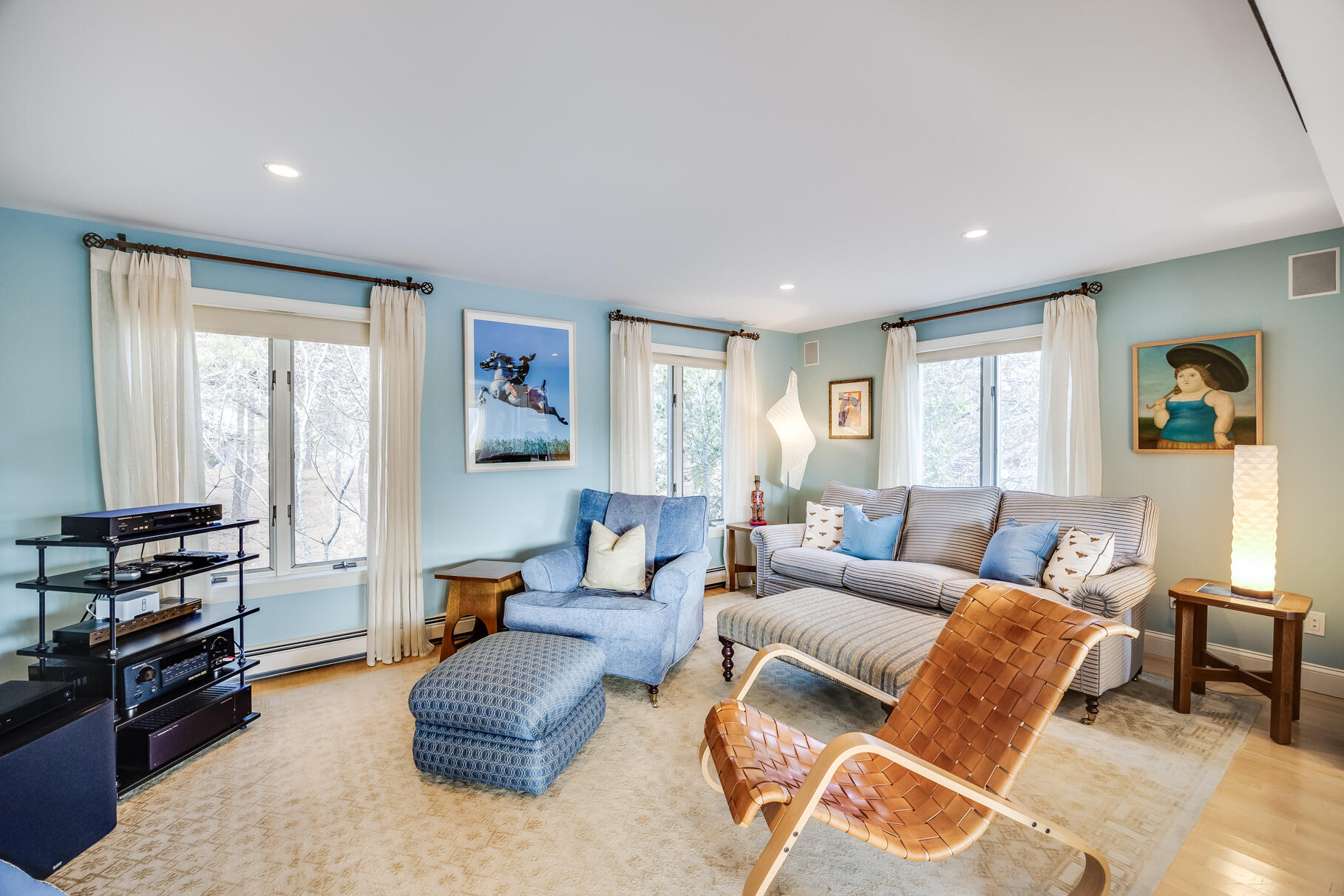 65 Massasoit Road Wellfleet, MA 02667 - Photo 32 of 86 a living room with furniture and a flat screen tv