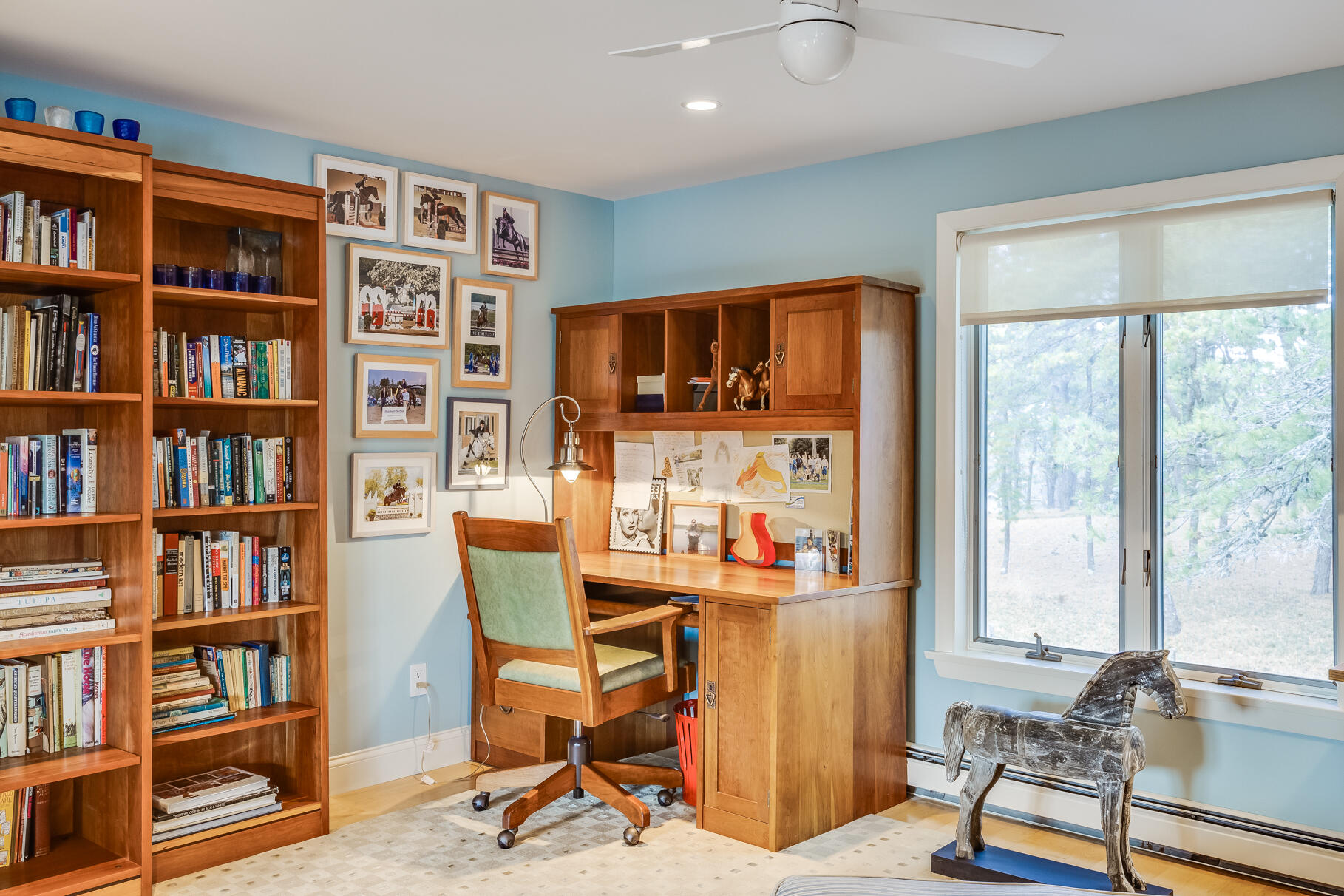 65 Massasoit Road Wellfleet, MA 02667 - Photo 38 of 86 a view of a workspace with furniture and a bookshelf