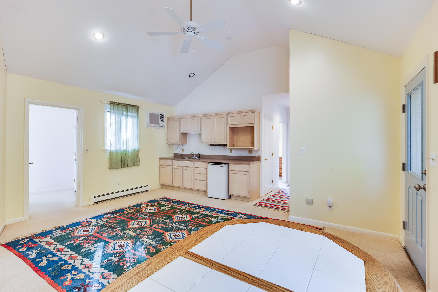 65 Massasoit Road Wellfleet, MA 02667 - Photo 55 of 86 a open kitchen with white cabinets and counter space