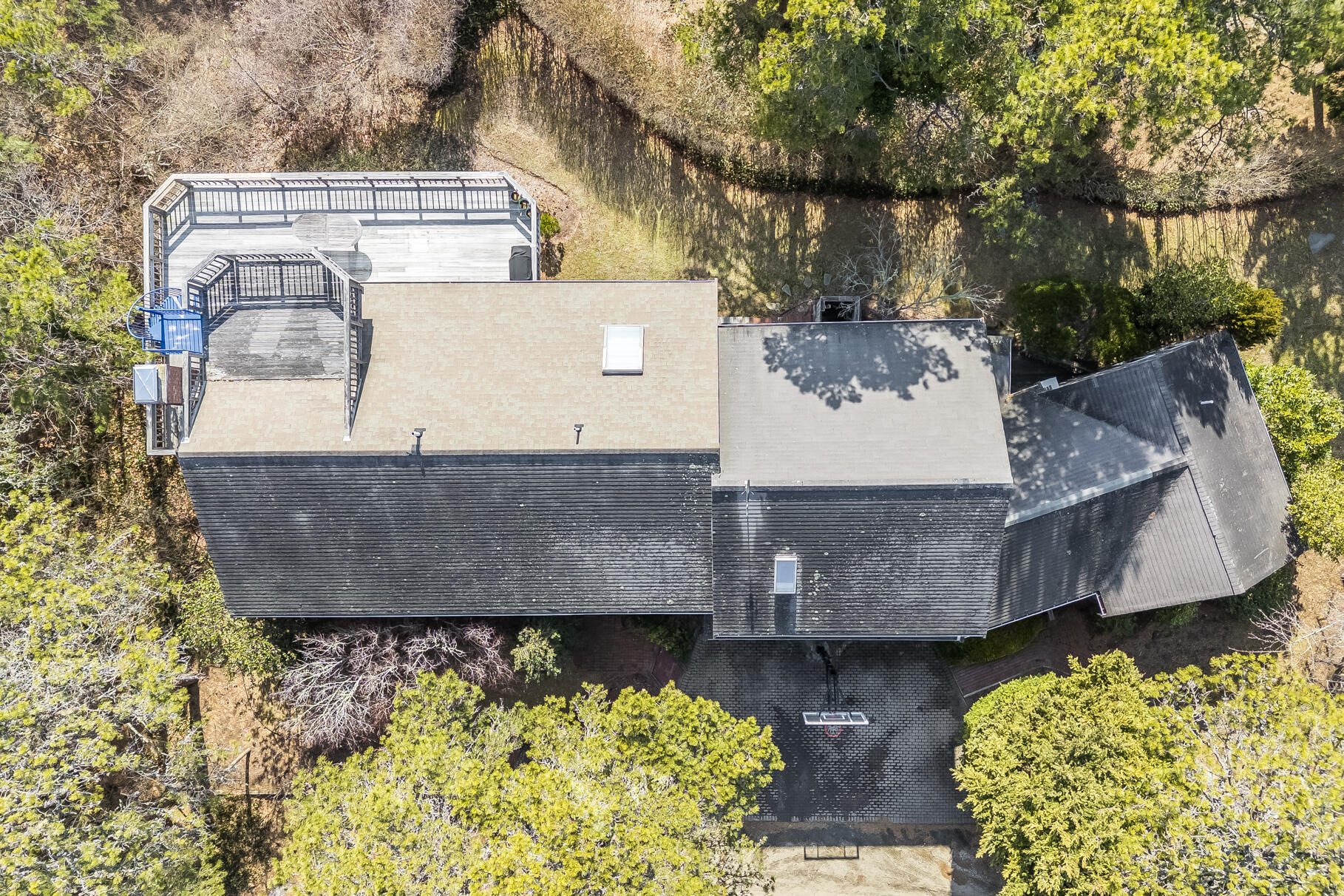 65 Massasoit Road Wellfleet, MA 02667 - Photo 60 of 86 an aerial view of a house with a yard and large trees