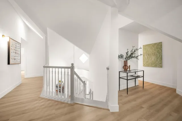 a bathroom with a sink vanity and a mirror