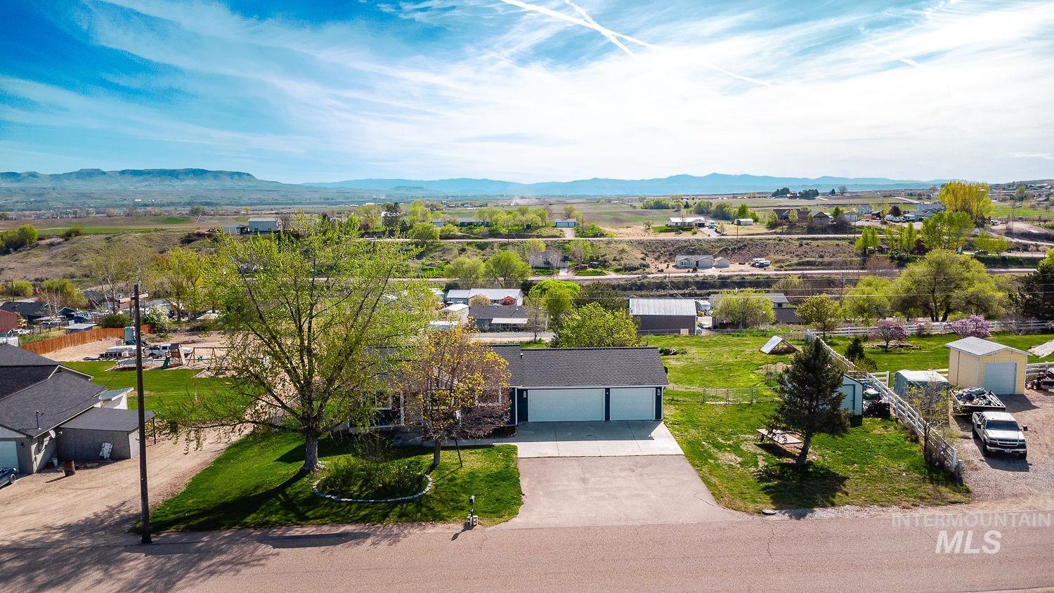 3950 Cassia Road New Plymouth, ID 83655 - Photo 24 of 26 Aerial view of a mountainous background