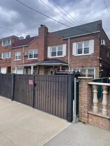 a front view of a building with glass windows