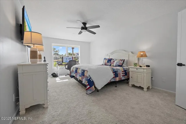 a bedroom with a bed and a cabinets