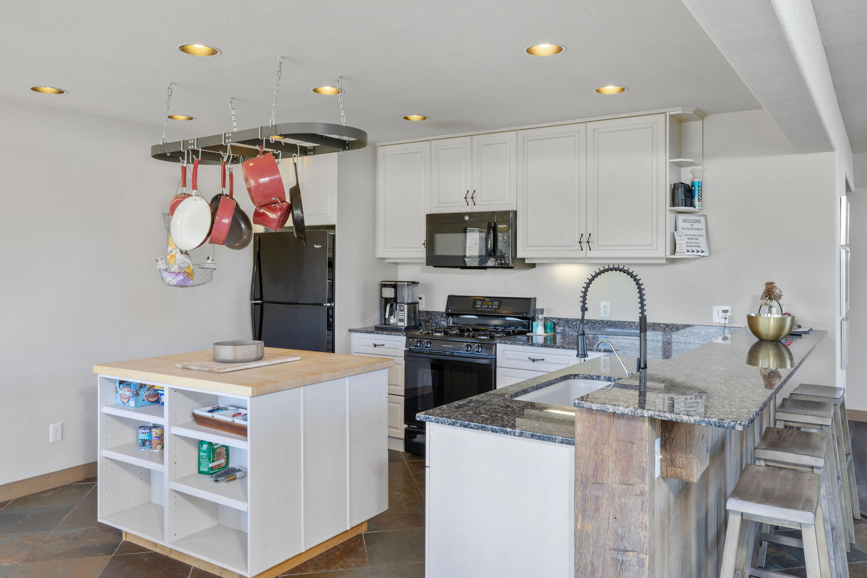 541 Elam Ridge Drive Placerville, CO 81430 - Photo 13 of 36 a kitchen that has a lot of cabinets in it and appliances