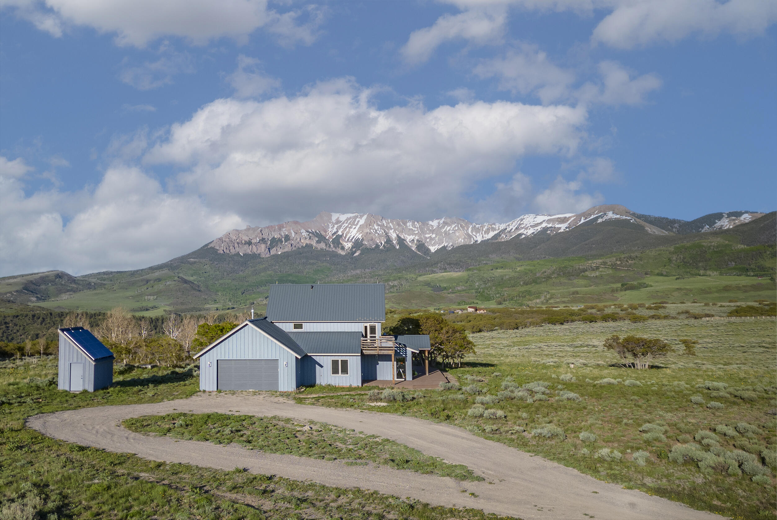 541 Elam Ridge Drive Placerville, CO 81430 - Photo 2 of 36 a view of a lake with a mountain in the background