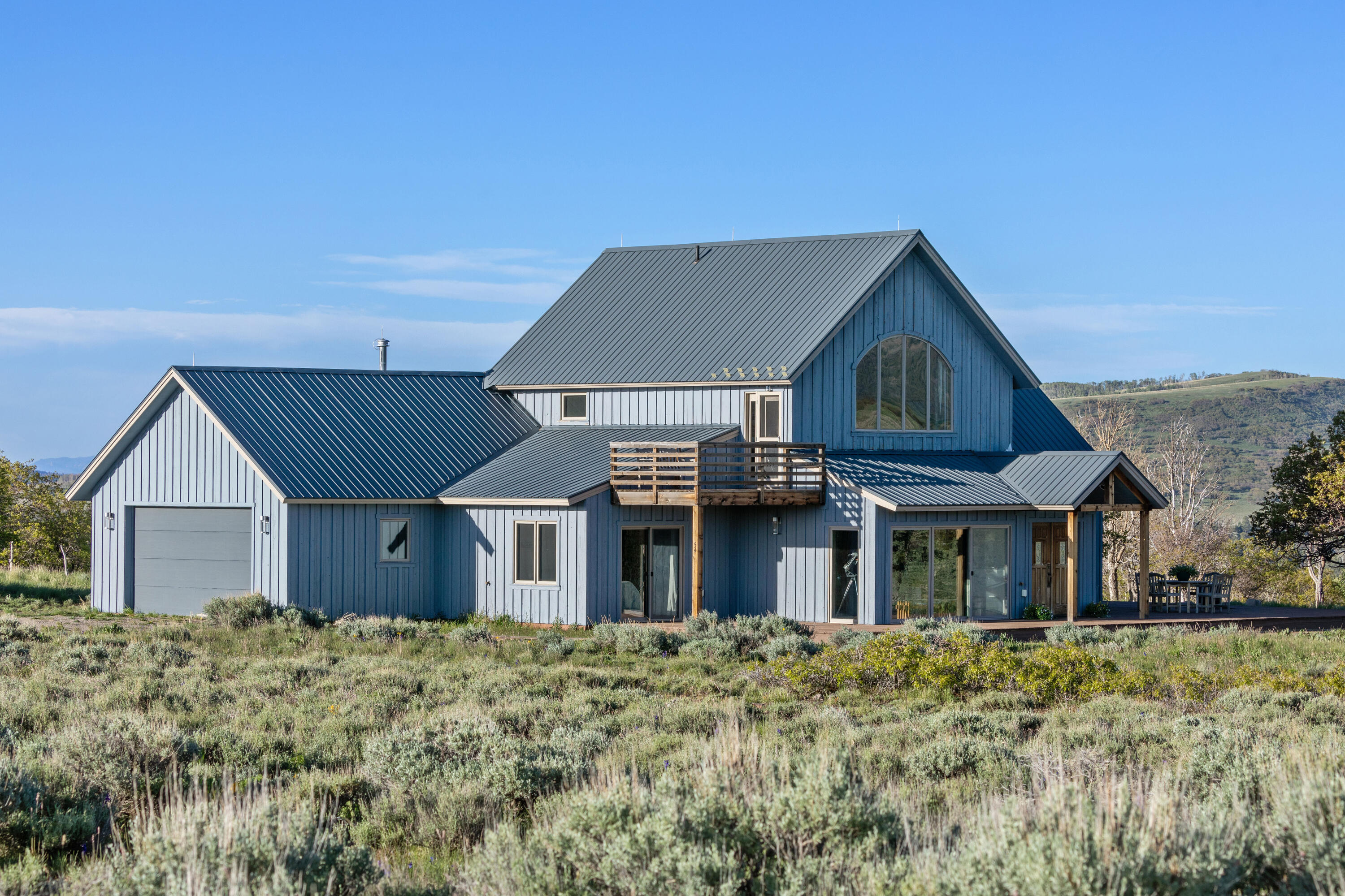 541 Elam Ridge Drive Placerville, CO 81430 - Photo 3 of 36 front view of a house with a yard