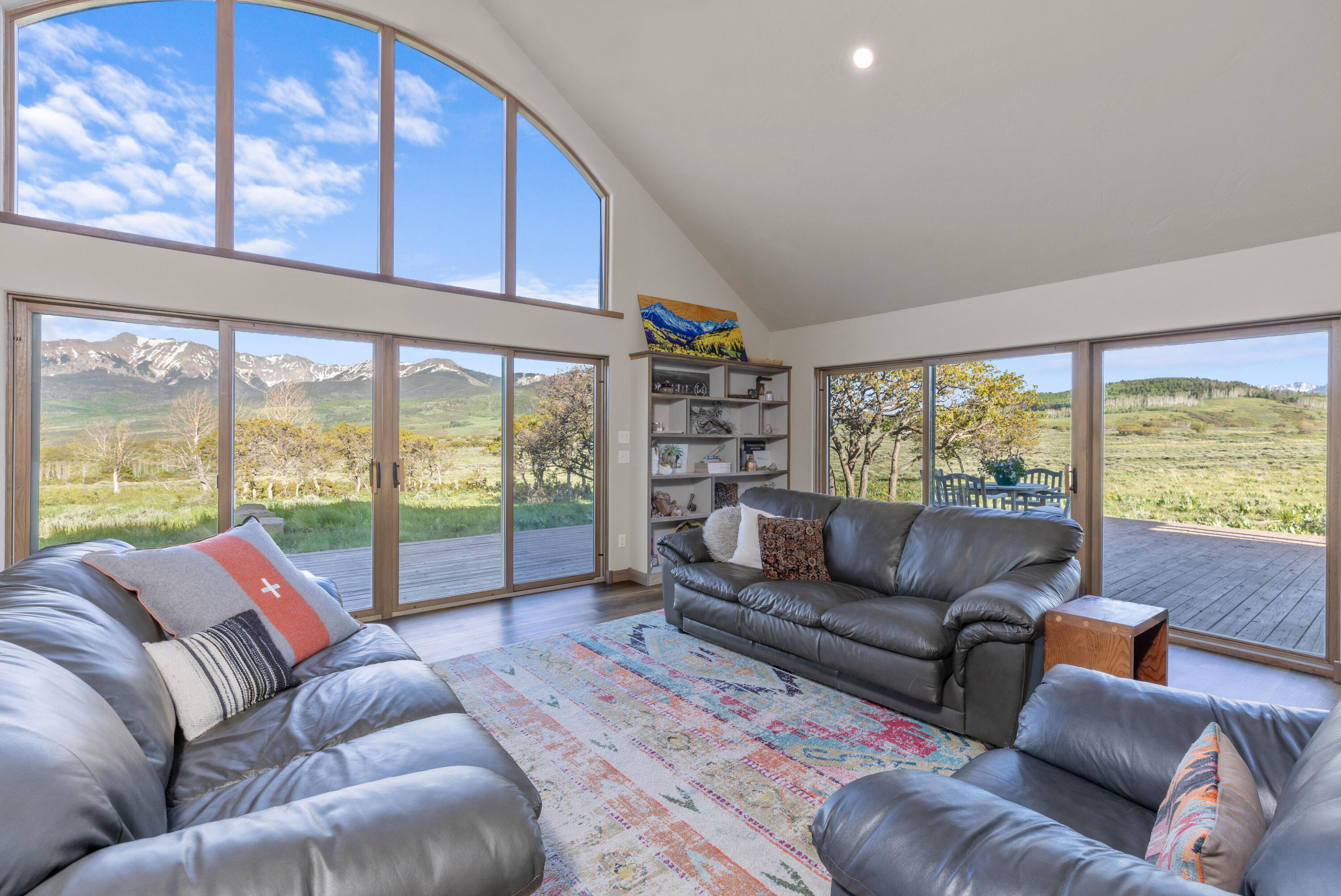 541 Elam Ridge Drive Placerville, CO 81430 - Photo 4 of 36 a living room with furniture and a large window
