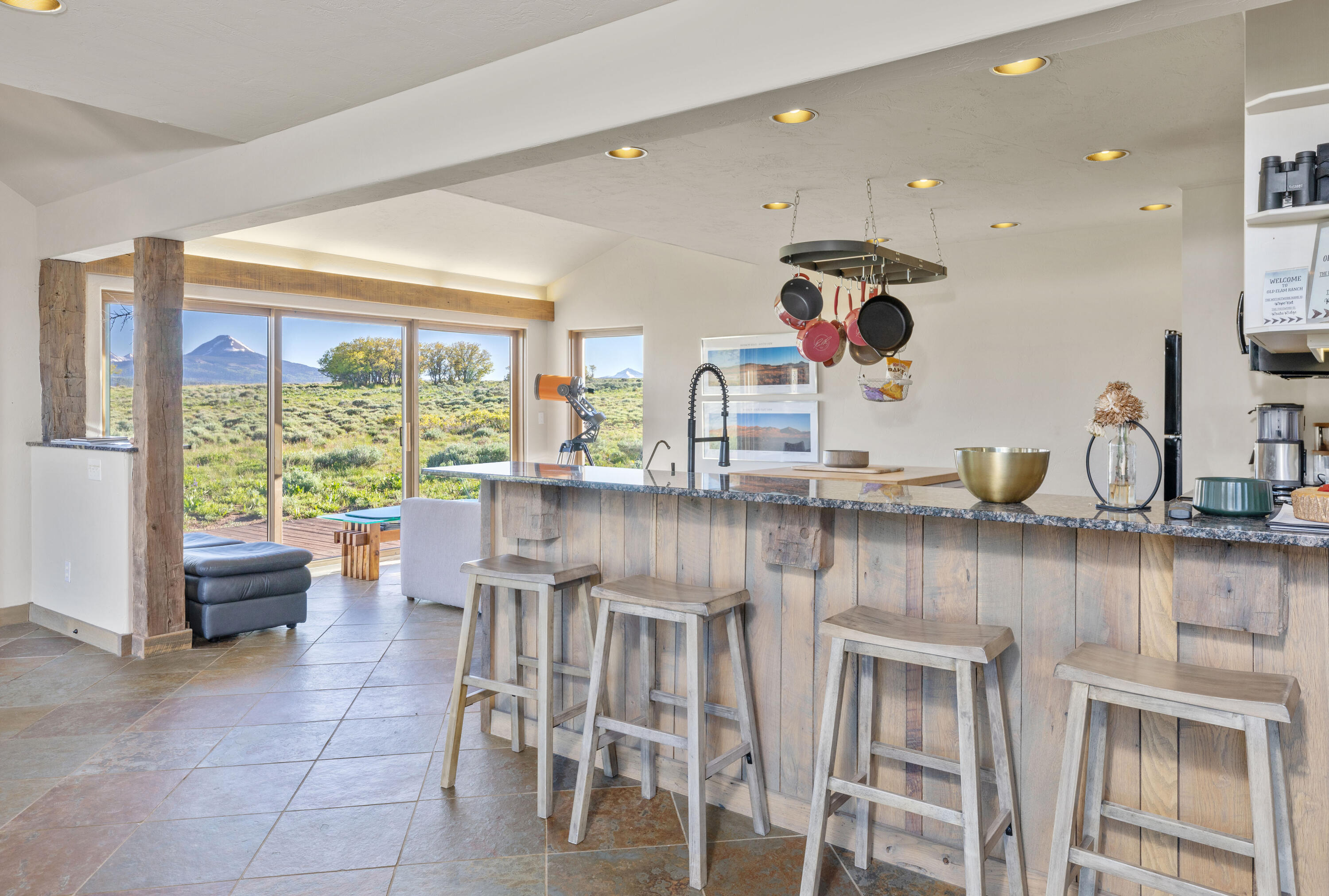 541 Elam Ridge Drive Placerville, CO 81430 - Photo 9 of 36 a kitchen with a sink and wooden cabinets