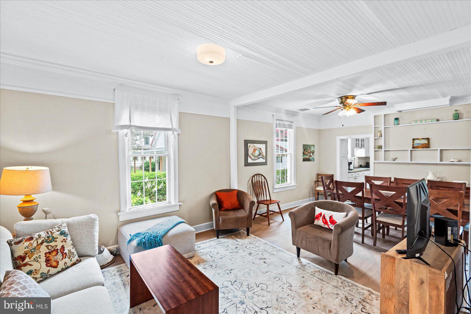 209 Hawthorn Street Colonial Beach, VA 22443 - Photo 11 of 56 a living room with furniture and a window
