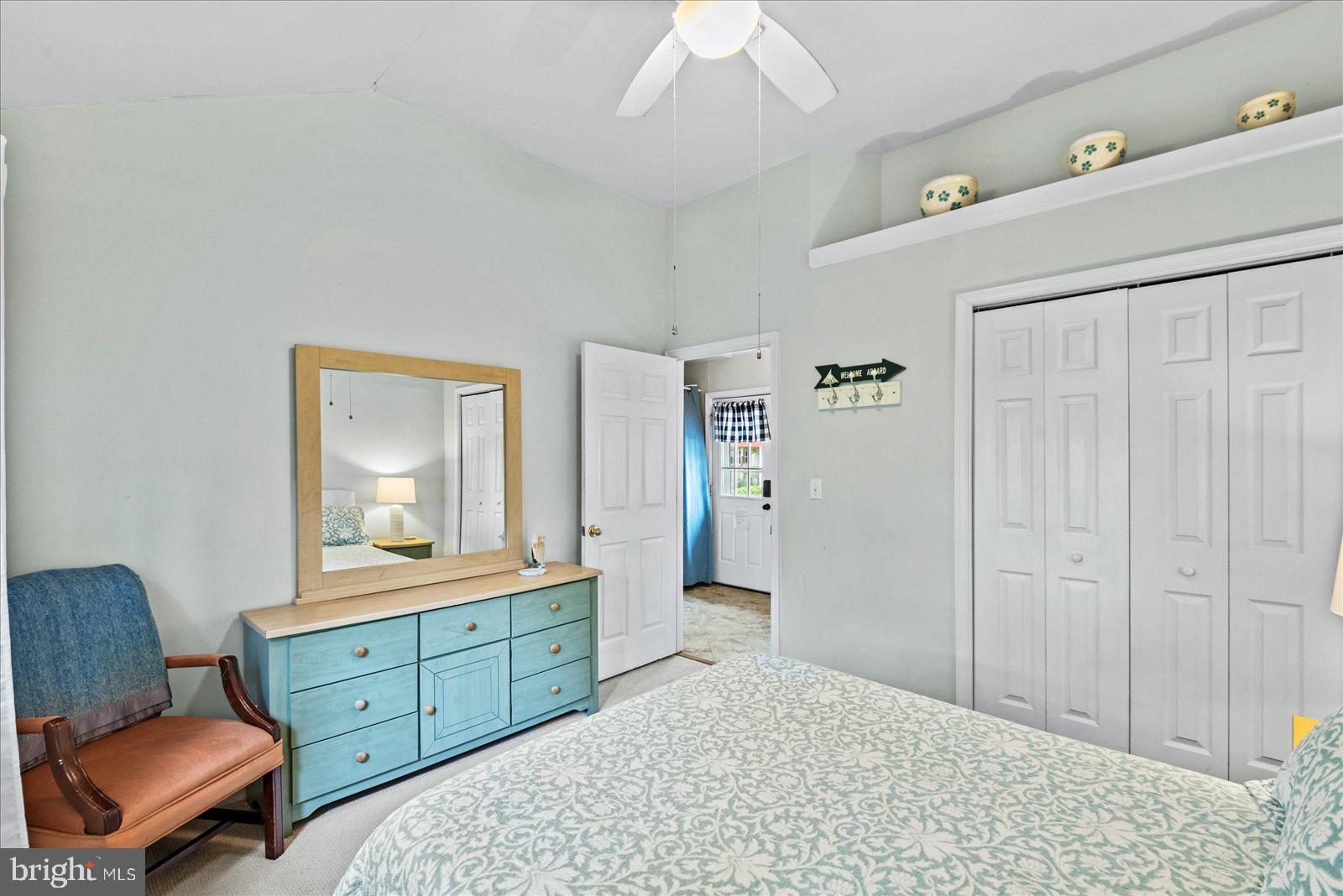 209 Hawthorn Street Colonial Beach, VA 22443 - Photo 22 of 56 a bedroom with a bed a dresser and a dresser