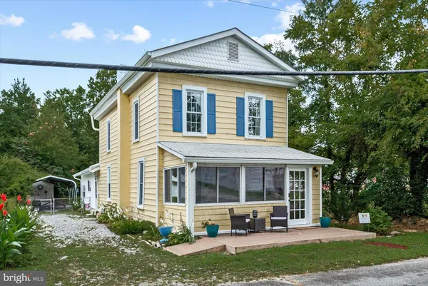 a house view with a garden space