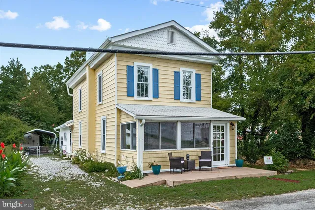 a house view with a garden space