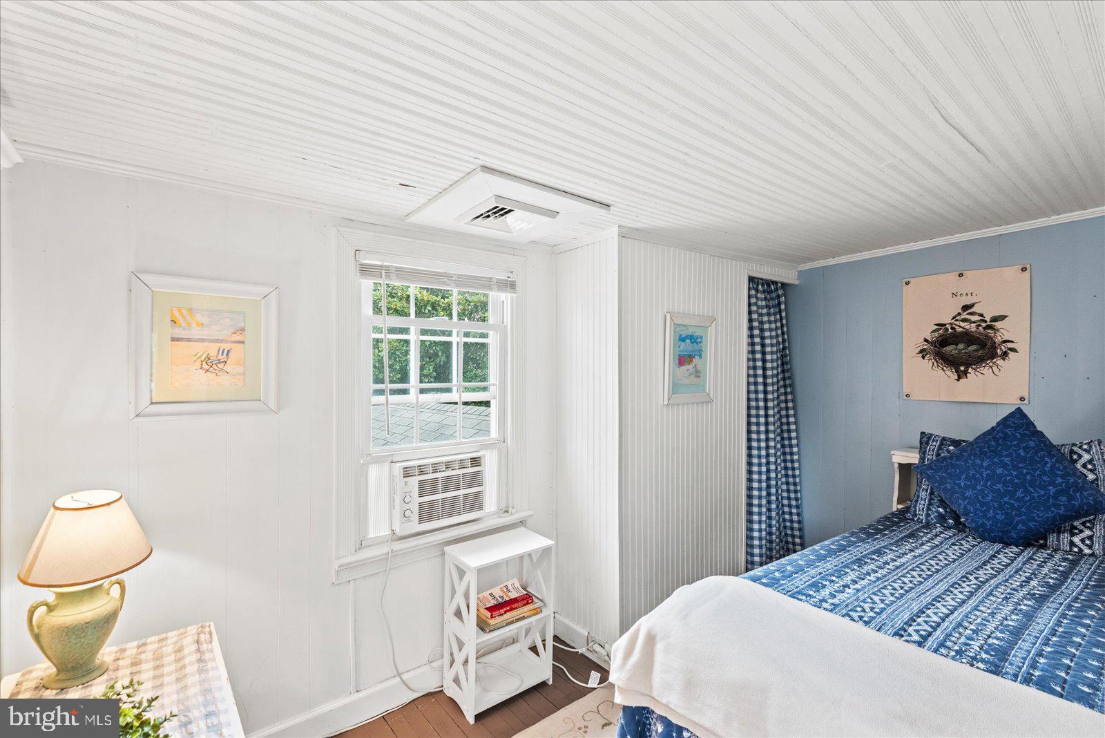 209 Hawthorn Street Colonial Beach, VA 22443 - Photo 31 of 56 a bedroom with a bed and a window