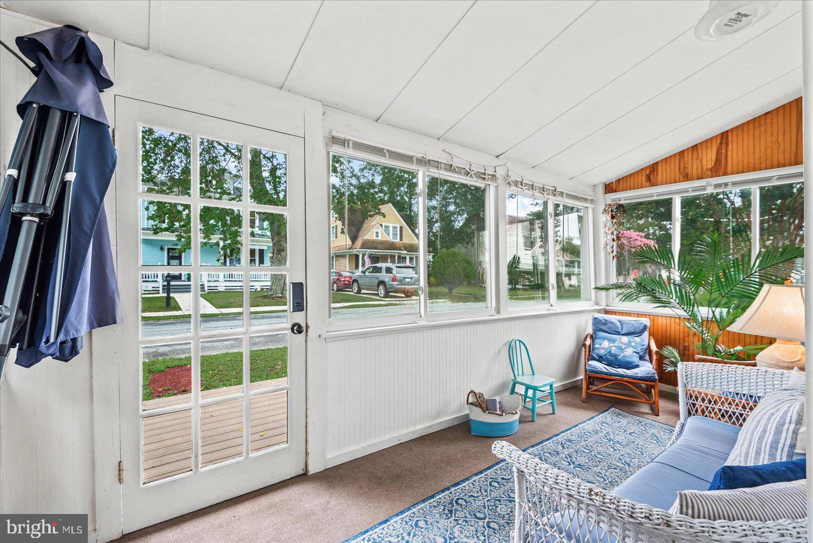 209 Hawthorn Street Colonial Beach, VA 22443 - Photo 7 of 56 a living room with furniture and a window