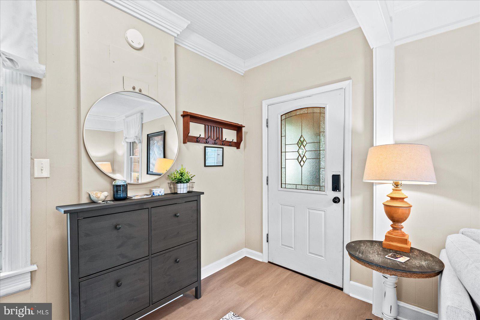 209 Hawthorn Street Colonial Beach, VA 22443 - Photo 10 of 56 a bathroom with a sink and a mirror