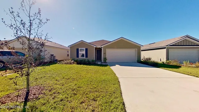 a view of outdoor space yard and garage