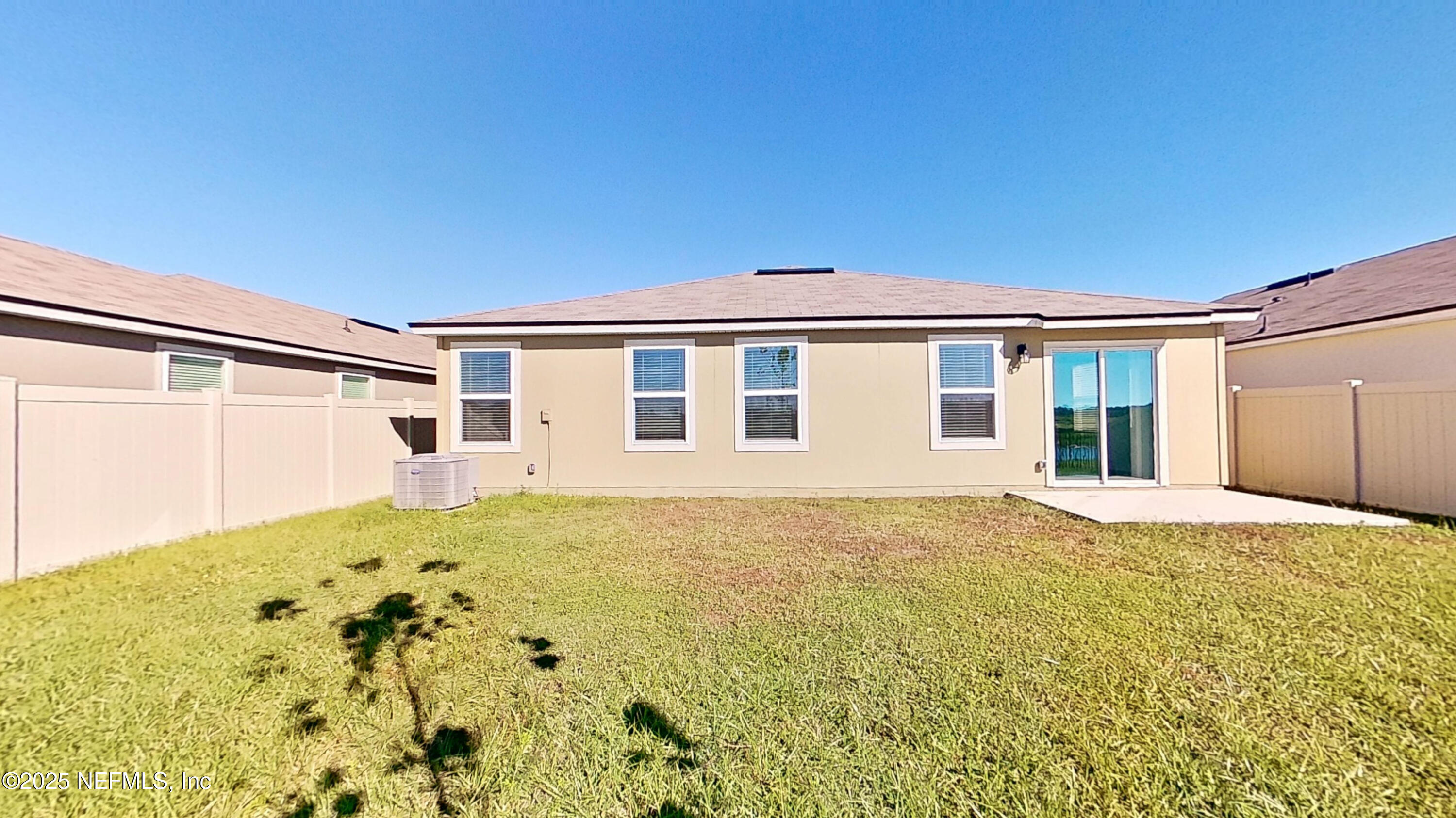 12452 Rubber Fig Terrace Jacksonville, FL 32218 - Photo 21 of 25 a front view of a house with a garden
