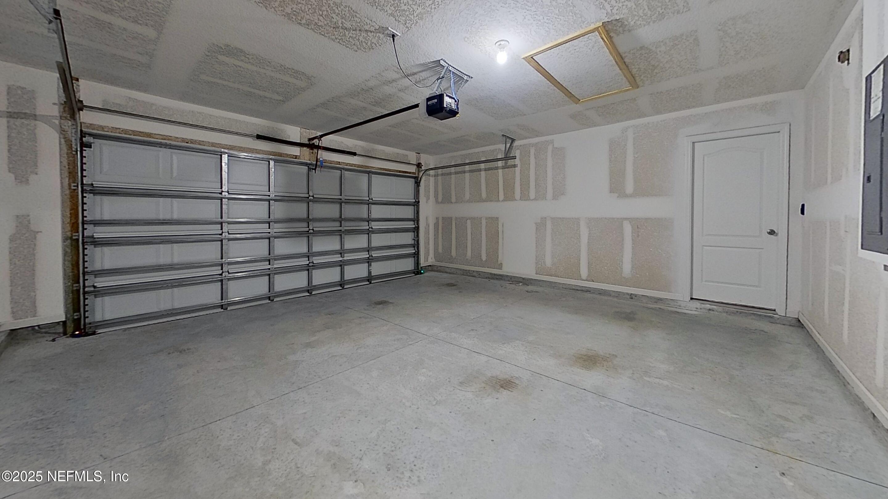 12452 Rubber Fig Terrace Jacksonville, FL 32218 - Photo 25 of 25 a view of a garage
