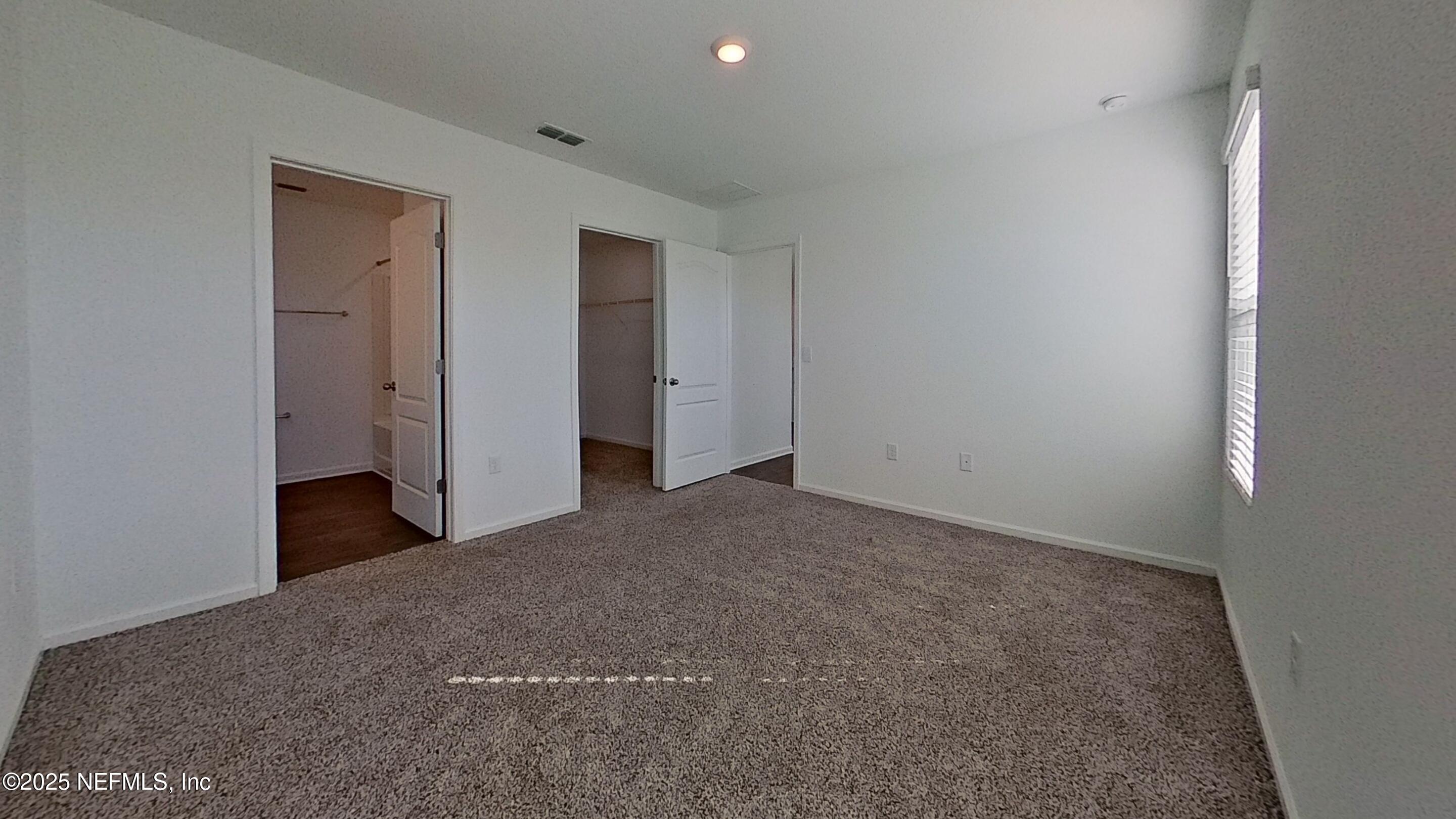 12452 Rubber Fig Terrace Jacksonville, FL 32218 - Photo 10 of 25 a view of an empty room