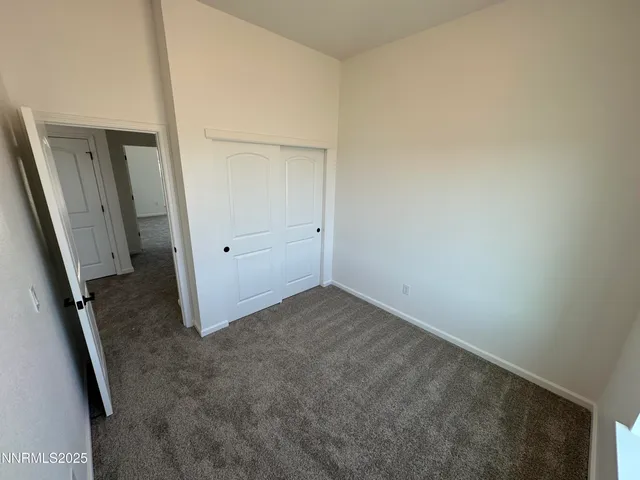an empty room with a door
