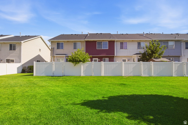 794 East 950 S Street Provo, UT 84606 - Photo 28 of 28 Expansive green lawn area featuring a white privacy fence