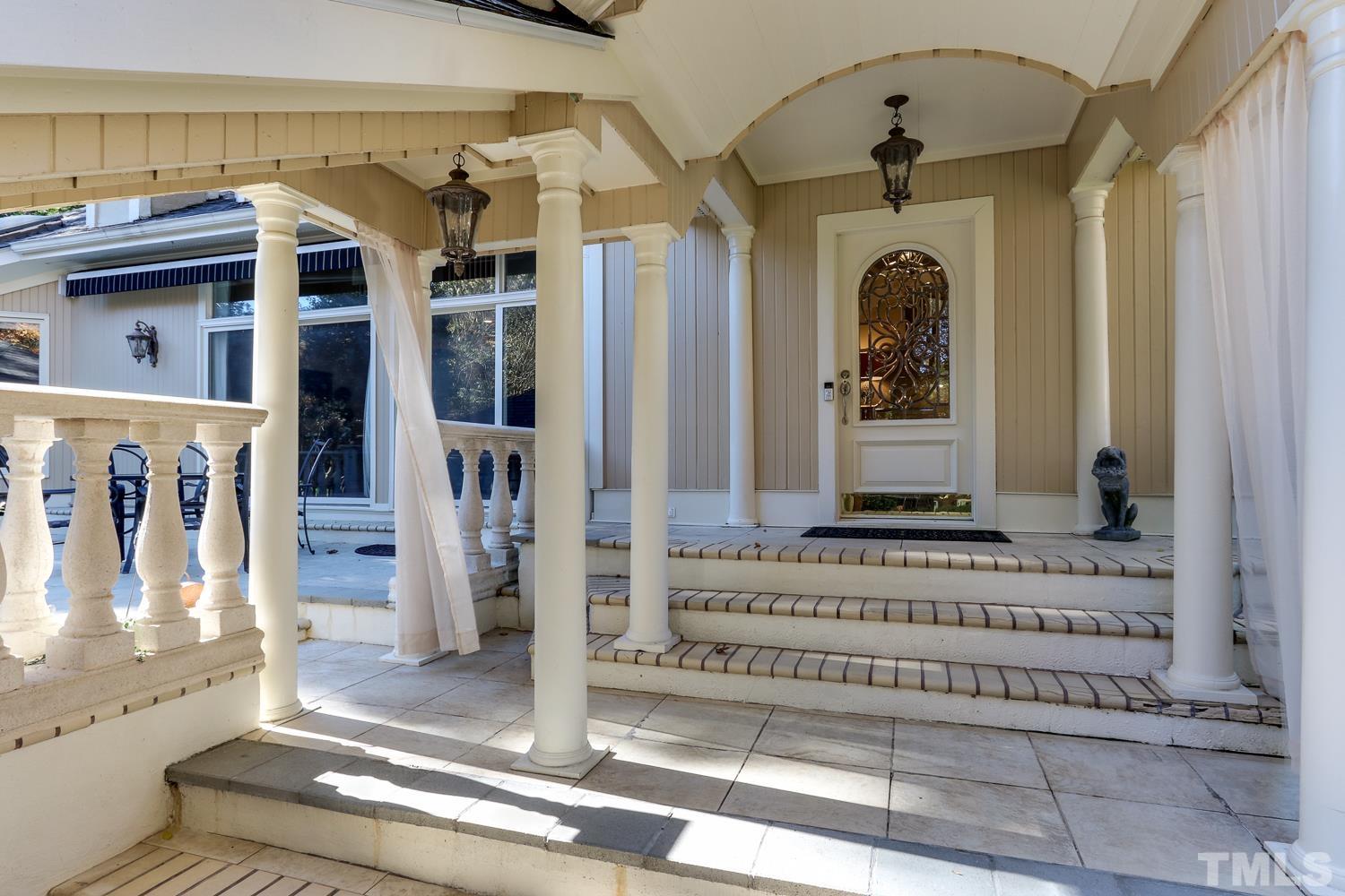 6921 Valley Ridge Court Raleigh, NC 27615 - Photo 5 of 27 a view of a entryway door of the house