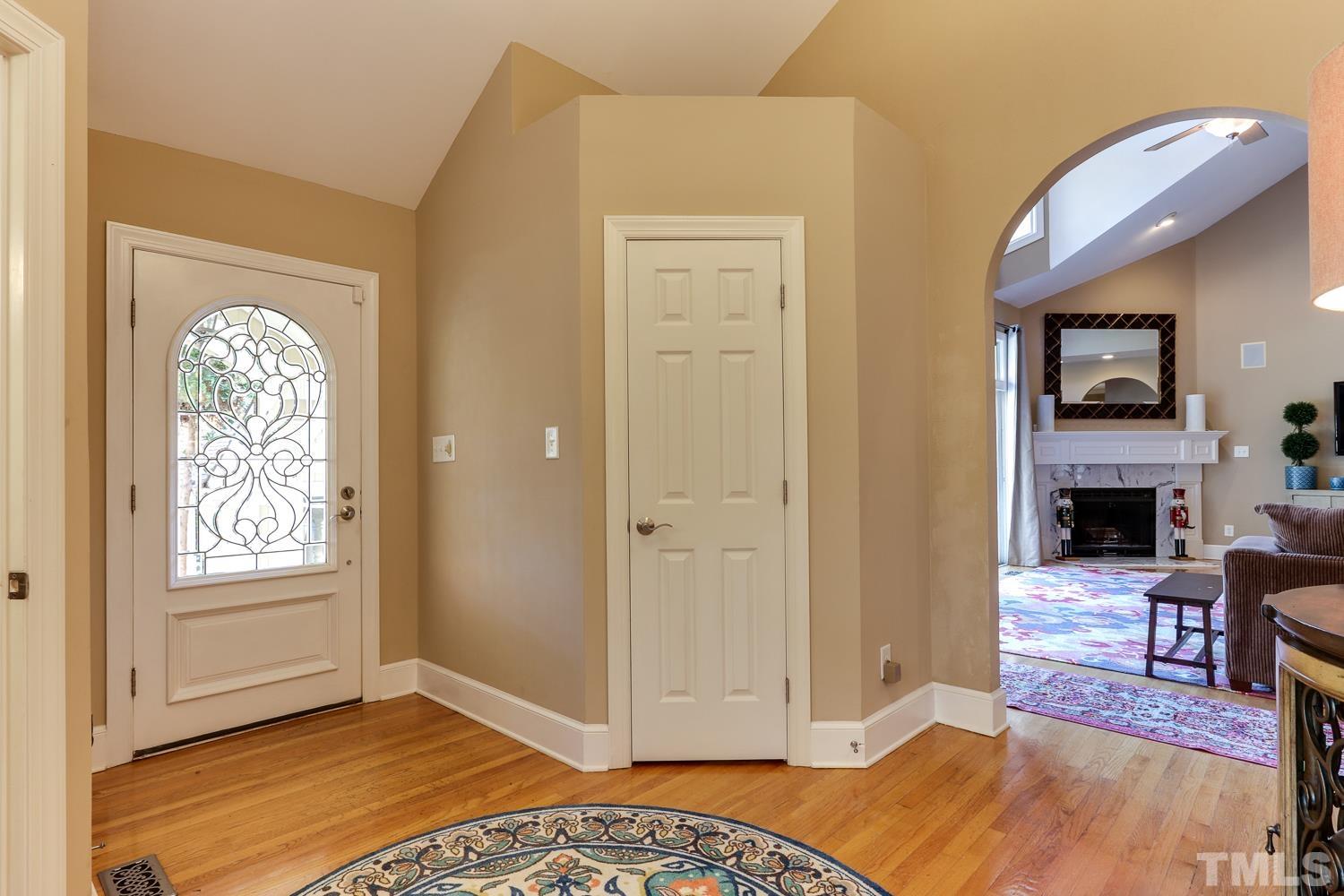6921 Valley Ridge Court Raleigh, NC 27615 - Photo 7 of 27 a view of livingroom with furniture and fireplace