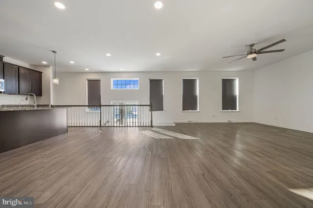 a view of a kitchen with a sink and a oven