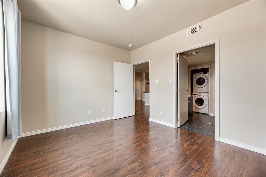 1100 West Trinity Mills Road, Unit 2040 Carrollton, TX 75006 - Photo 15 of 21 wooden floor in an empty room
