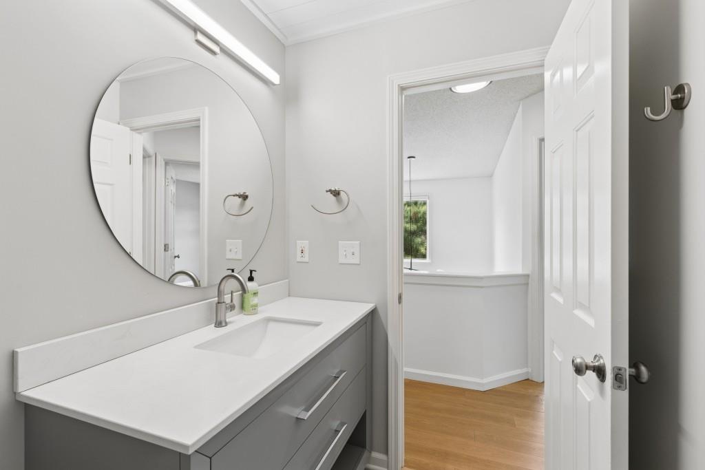 2120 Traywick Chase Alpharetta, GA 30004 - Photo 38 of 54 a bathroom with a sink vanity and a mirror