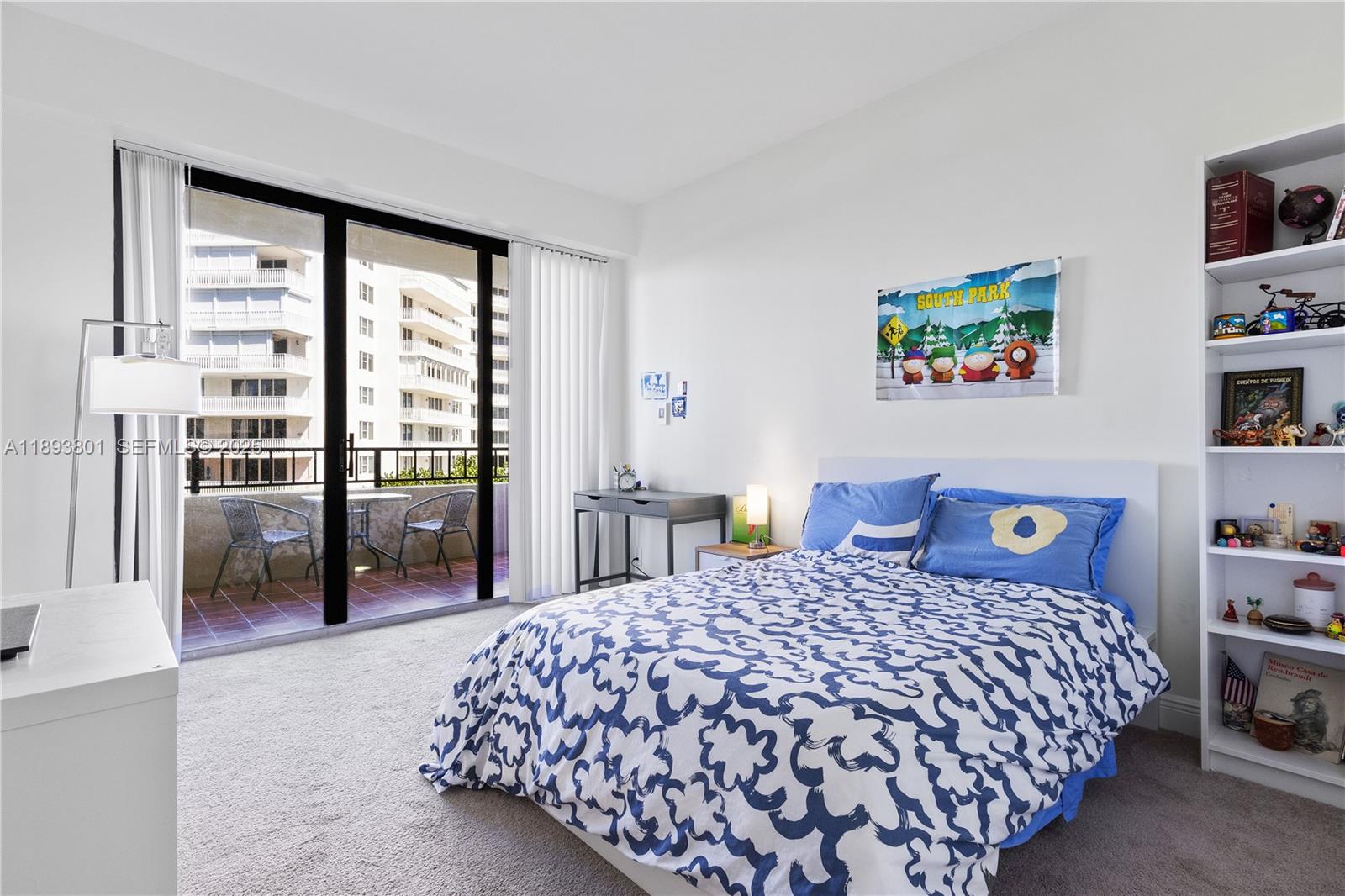 251 Crandon Boulevard, Unit 441 Key Biscayne, FL 33149 - Photo 21 of 28 a bedroom with a large bed and a window