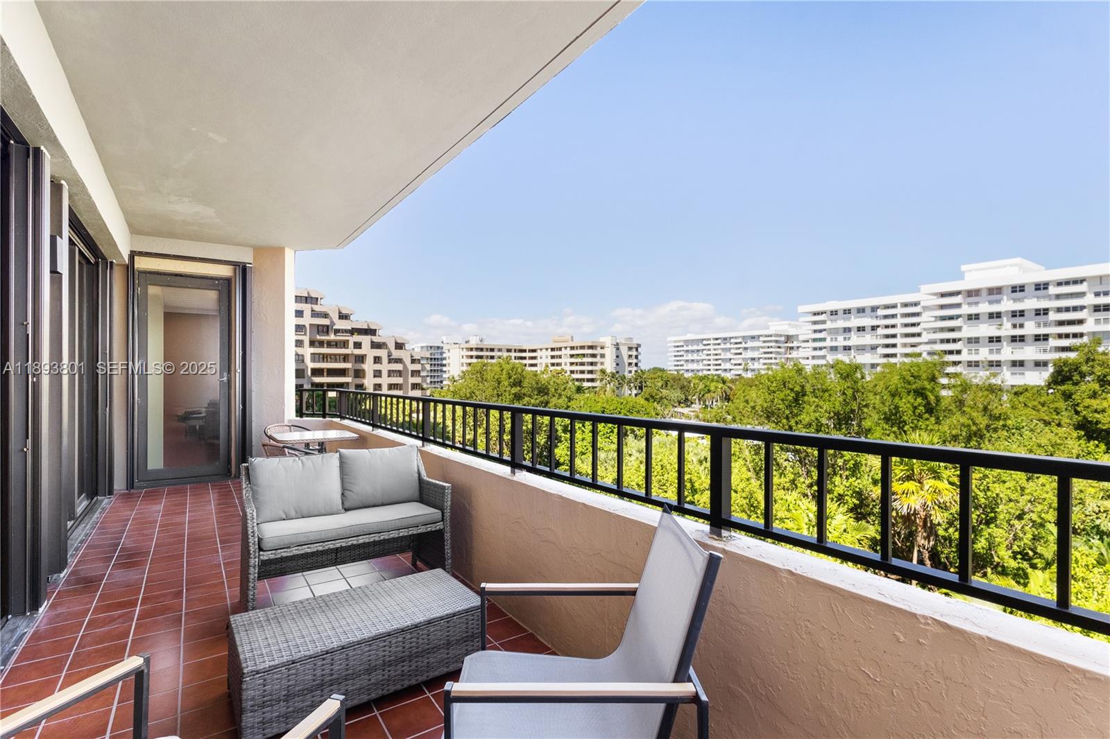 251 Crandon Boulevard, Unit 441 Key Biscayne, FL 33149 - Photo 7 of 28 a view of balcony with couch