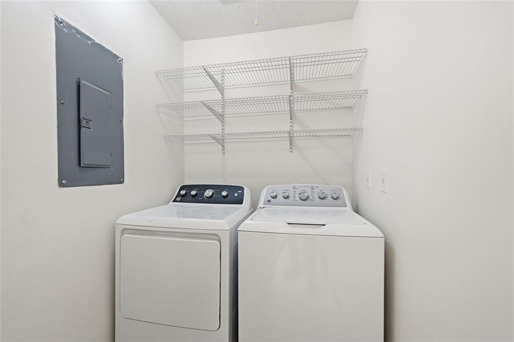 1512 Upper Sassafras Road Jasper, GA 30143 - Photo 30 of 41 a utility room with dryer and washer
