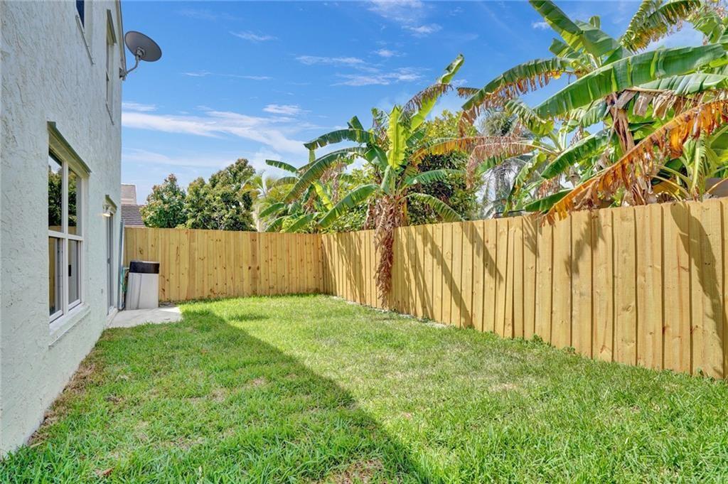 3329 Apache Lane Margate, FL 33063 - Photo 4 of 5 a view of backyard with wooden fence