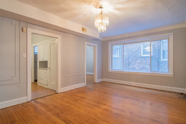 a view of livingroom with hardwood floor and window