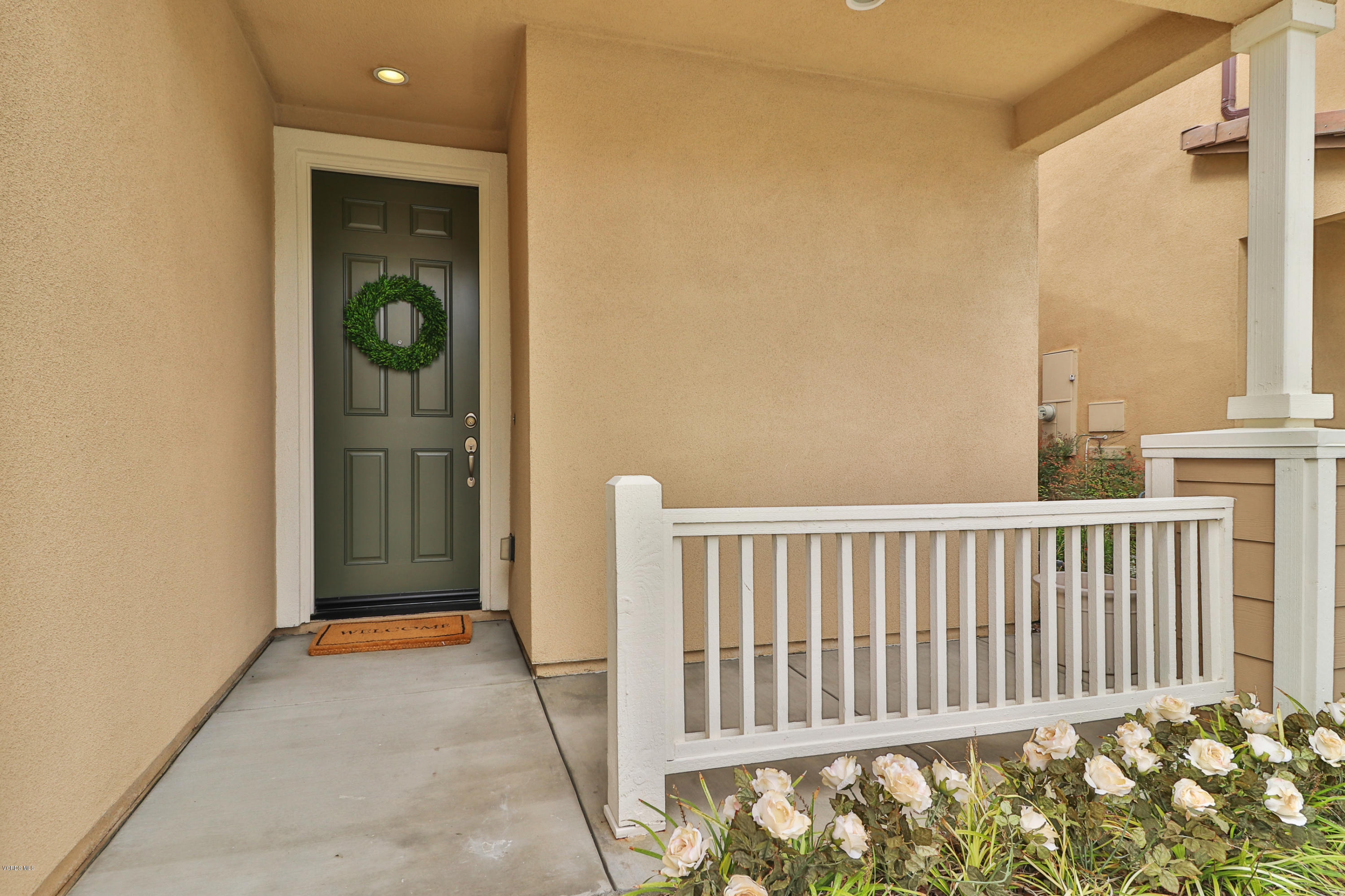 4805 Edenbridge Road Moorpark, CA 93021 - Photo 3 of 44 a view of a porch with wooden floor